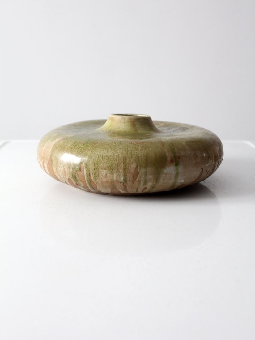Vintage Ceramic Vase Green Pink Beige Drip Glaze 11.5" Diameter: Vintage Ceramic Vase Green Pink Beige Drip Glaze 11.5" Diameter This vintage ceramic vase showcases a unique and artistic design with a large low profile and a short bottle neck leading to a broad bod