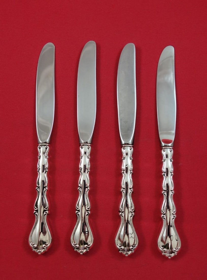 Towle Country Manor Sterling Butter Spreaders Set of 4 6 5 8: Towle Country Manor Sterling Butter Spreaders Set of 4 6 5 8 This set includes four Towle Country Manor butter spreaders, each crafted with a sterling silver hollow handle and a stainless steel modern