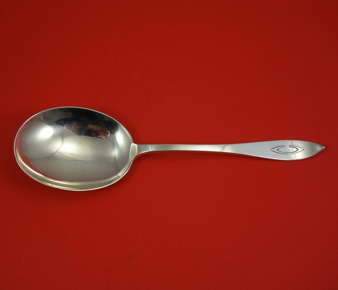 Sterling Silver Serving Spoon Shreve Buckingham Narrow Applied C: Sterling Silver Serving Spoon Shreve Buckingham Narrow Applied C A sterling silver vegetable serving spoon in the Buckingham Narrow pattern by Shreve. Made in the United States and dating to the 1900-