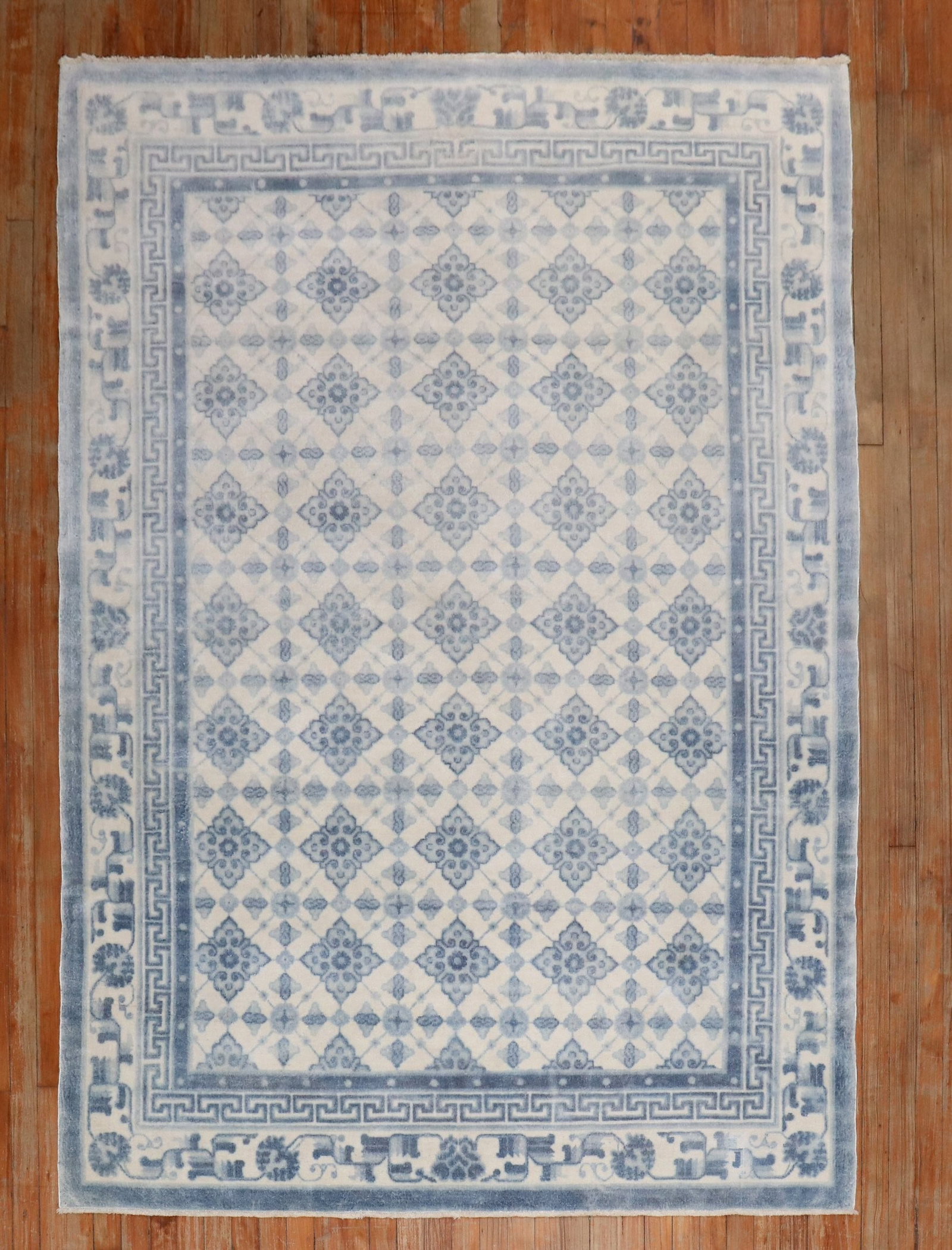 5' 6" x 7' 10" Chinese Peking Rug in White and Blue: 5' 6" x 7' 10" Chinese Peking Rug in White and Blue Pre-owned Chinese Peking rug from the 3rd quarter of the 20th century, featuring a white and blue color palette. Specifications Item Type: Rug Style