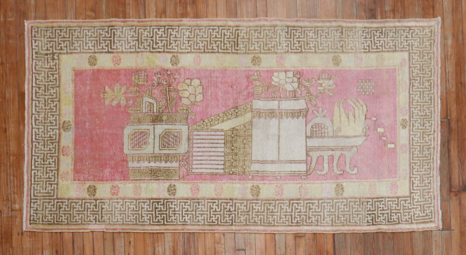 4' x 7' 10" Natural Pink Khotan Samarkand Rug: 4' x 7' 10" Natural Pink Khotan Samarkand Rug Early 20th century Khotan Samarkand accent rug in a natural pink color. This pre-owned rug features decorative motifs consistent with the style, including