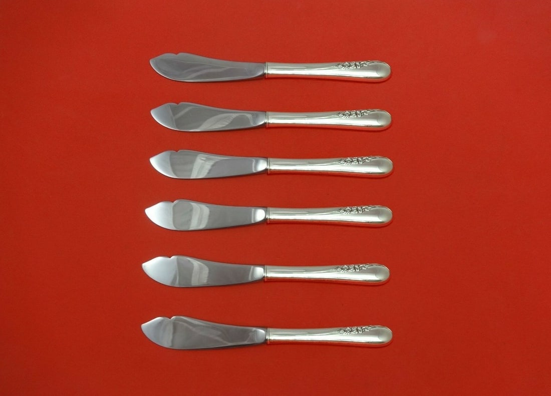 International Blossom Time Sterling Silver 6pc Trout Knife Set 7.5": International Blossom Time Sterling Silver 6pc Trout Knife Set 7.5" Enhance your dining experience with this exquisite 6-piece trout knife set from the Blossom Time pattern by International. Crafted f