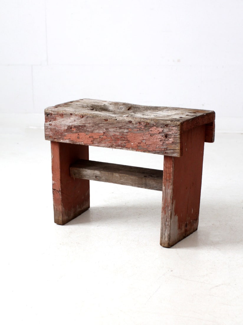 Vintage Rustic Wooden Farmhouse Bench with Weathered Red Paint: Vintage Rustic Wooden Farmhouse Bench with Weathered Red Paint Discover the charm of this Vintage Rustic Small Farmhouse Bench, a perfect addition to any entryway or as a stylish plant stand. Crafted 