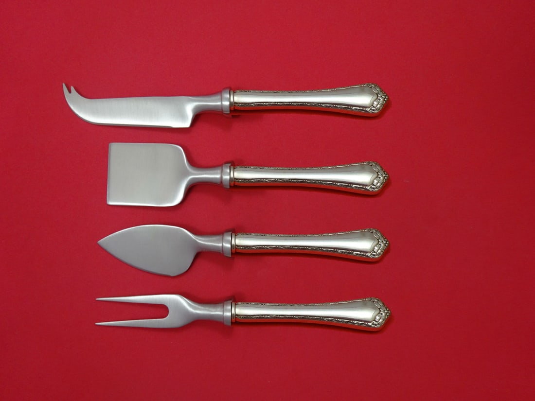 Easterling Rosemary Sterling Silver 4 Piece Cheese Serving Set: Easterling Rosemary Sterling Silver 4 Piece Cheese Serving Set Enhance your cheese serving experience with this exquisite 4-piece Hostess Set in the elegant Rosemary pattern by Easterling. Crafted fro