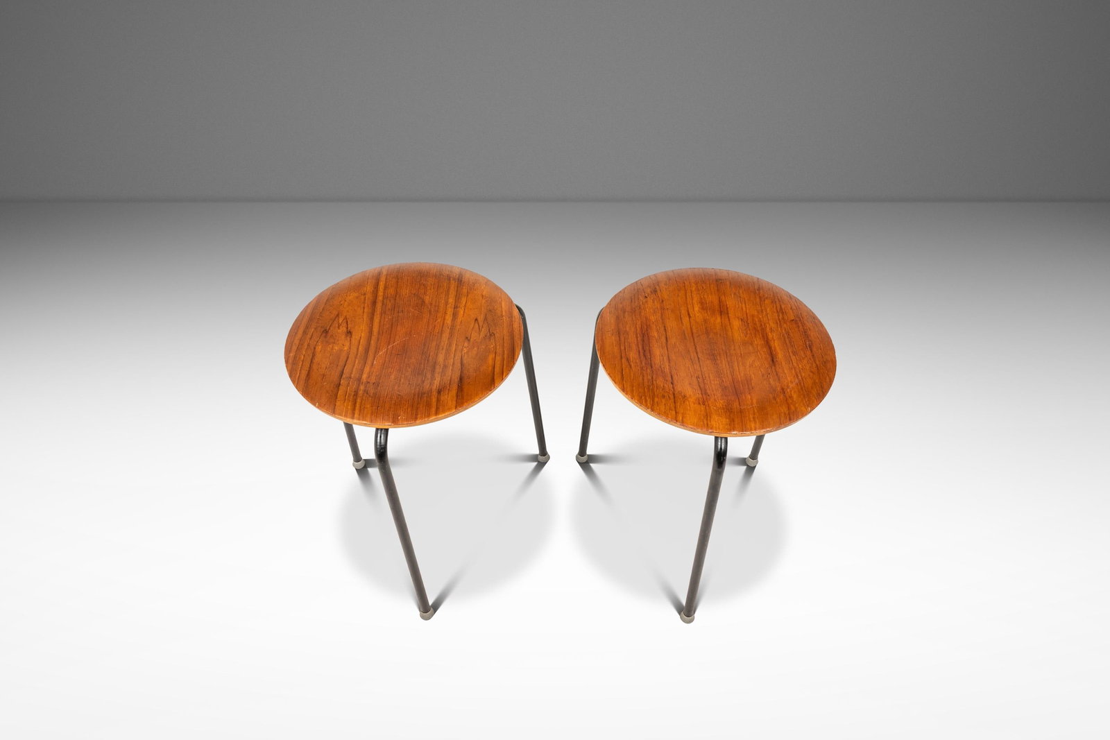 Pair of Arne Jacobsen Fritz Hansen Model 3170 Dot Teak Stools: Pair of Arne Jacobsen Fritz Hansen Model 3170 Dot Teak Stools Set of two early Model 3170 "Dot" stools / nesting tables designed by Arne Jacobsen for Fritz Hansen, Denmark, circa 1960s. This signed vi