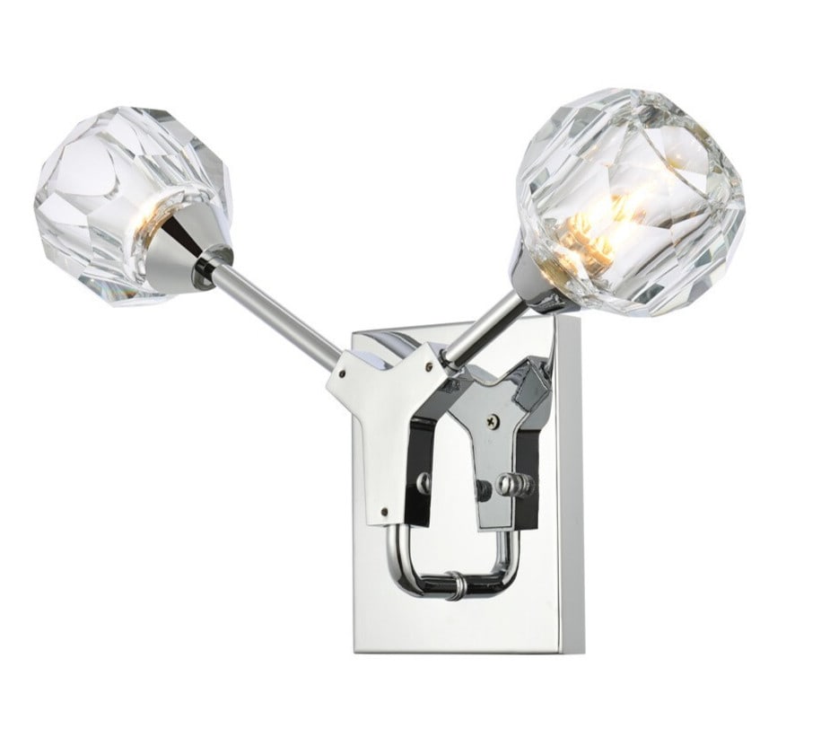 Zayne 15 in Chrome Crystal 2-Light Wall Sconce: Zayne 15 in Chrome Crystal 2-Light Wall Sconce Modern hardwired wall light fixture in a chrome plated finish with crystal and iron construction. It features 2 lights, a round faceted cut clear crystal
