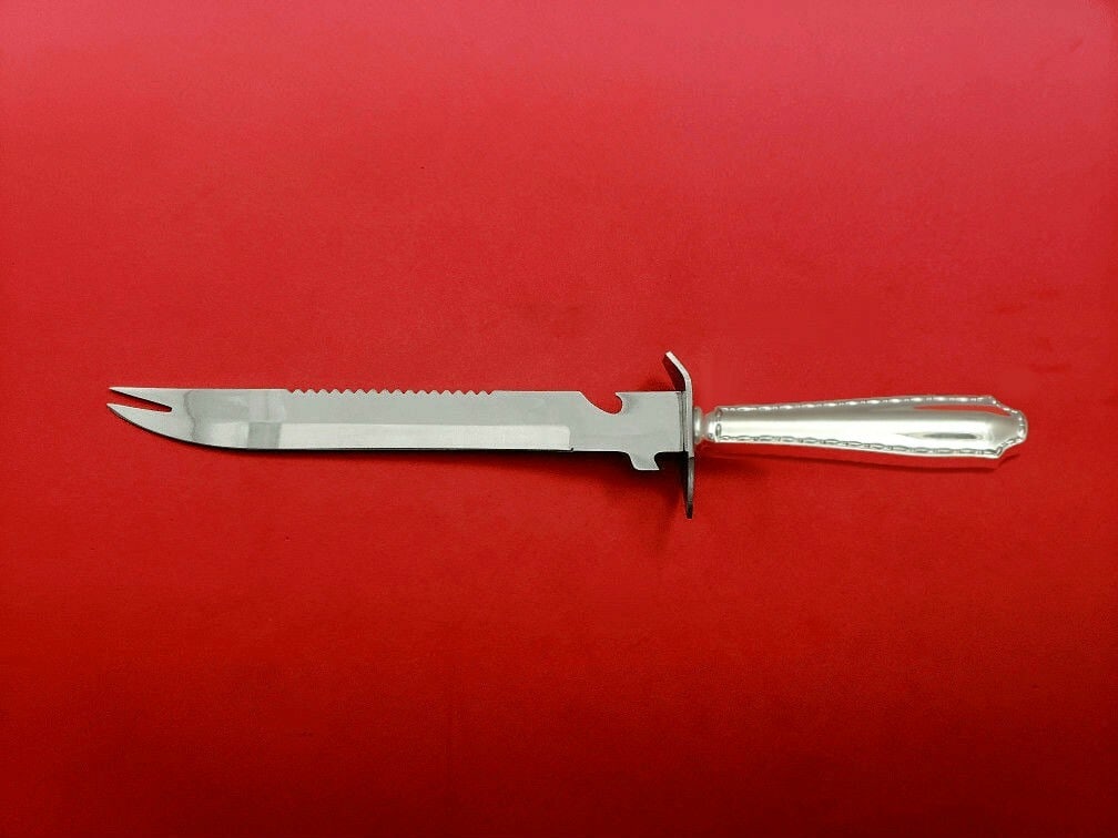 Tiffany & Co Marquise Sterling Silver Ham Slice Custom Made 11.5" Knife: Tiffany & Co Marquise Sterling Silver Ham Slice Custom Made 11.5" Knife This exquisite ham slice from Tiffany & Co. features a striking Marquise pattern and is expertly crafted from sterling silver. I