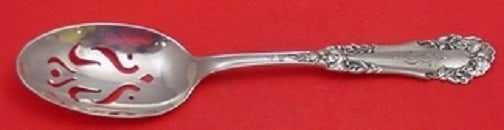 International Sterling Silver Marcell Slotted Serving Spoon 7 7/8": International Sterling Silver Marcell Slotted Serving Spoon 7 7/8" This exquisite serving spoon features the Marcell pattern by International, crafted from high-quality sterling silver. Measuring 7 7/