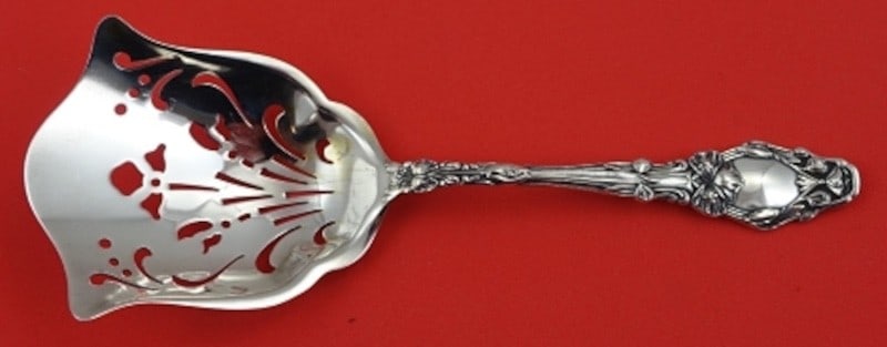 Gorham Virginiana Sterling Silver Almond Scoop 5 7/8": Gorham Virginiana Sterling Silver Almond Scoop 5 7/8" Sterling silver almond scoop in the Virginiana pattern by Gorham. This serving piece measures 5 7/8 inches and is not monogrammed. It is pre-owned