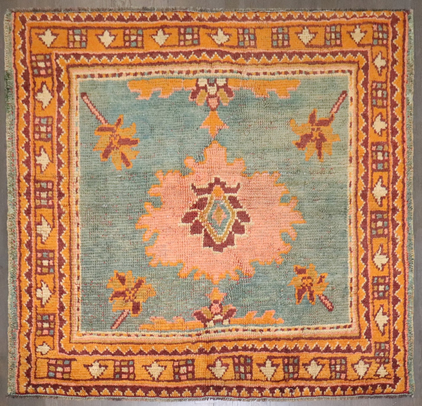 3' 1" x 3' 2" Small Square Oushak Carpet Blue Orange: 3' 1" x 3' 2" Small Square Oushak Carpet Blue Orange Early 20th century Oushak carpet in a small square format. This pre-owned rug is described as a blue and orange old square Oushak rug. Specificatio