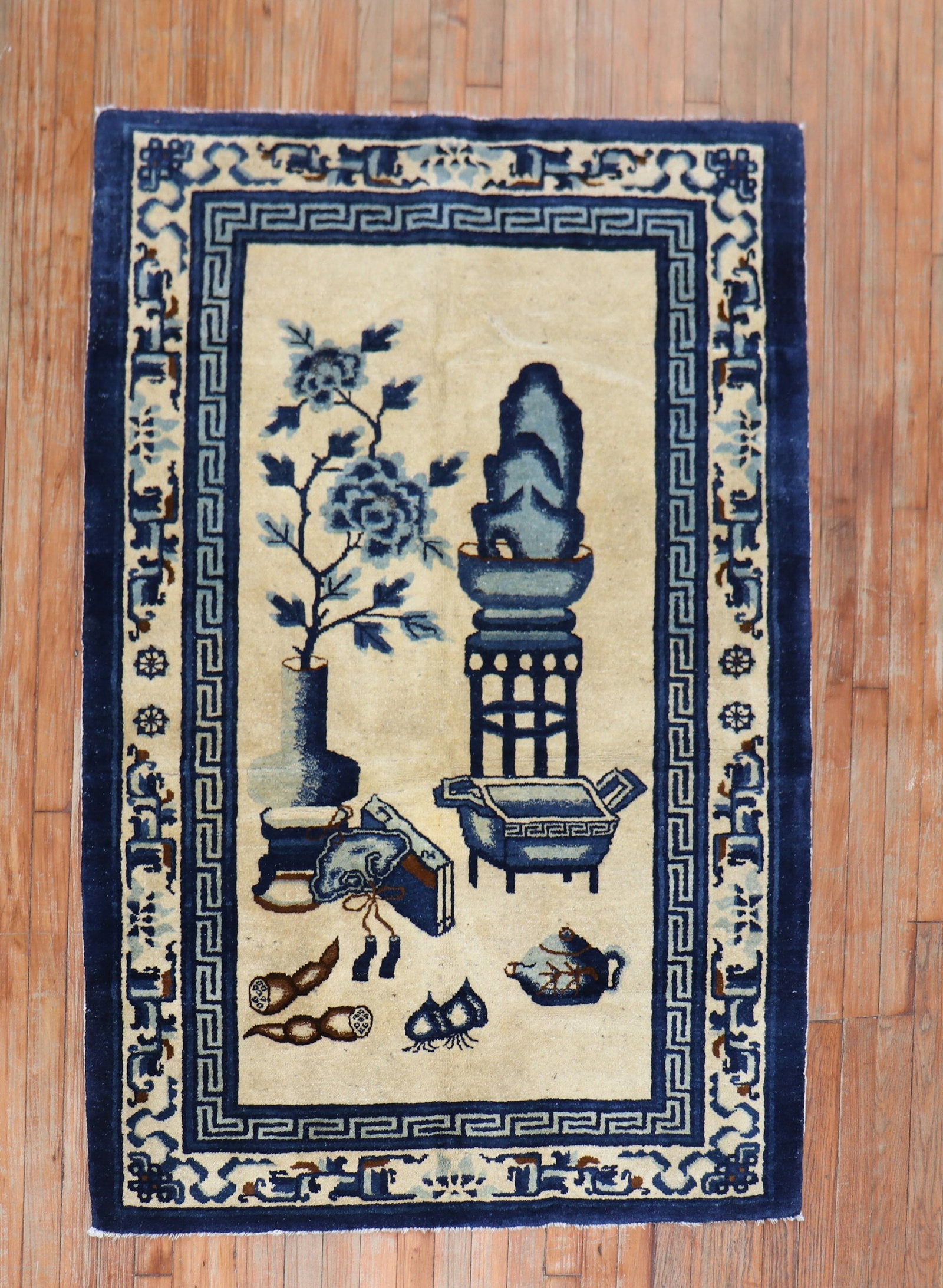 3' 8" x 5' 7" Antique Chinese Peking Rug in Tan and Blue: 3' 8" x 5' 7" Antique Chinese Peking Rug in Tan and Blue Early 20th century Chinese Peking carpet in tan and blue, featuring a whimsical motif. This pre-owned small rug is in even full pile condition.