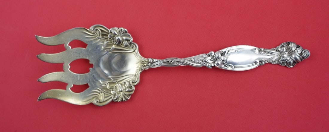 International Silver Frontenac Gold Washed Fish Serving Fork 8 3/4": International Silver Frontenac Gold Washed Fish Serving Fork 8 3/4" This exquisite Frontenac fish serving fork by International Sterling is a timeless piece, crafted from sterling silver and featuring