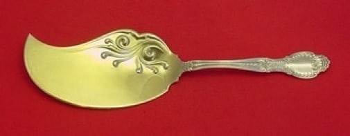 Tiffany & Co. Richelieu Sterling Silver Dolphin Ice Cream Server 11 1/4": Tiffany & Co. Richelieu Sterling Silver Dolphin Ice Cream Server 11 1/4" This exquisite ice cream server, crafted in the renowned Richelieu pattern by Tiffany & Co., showcases a stunning dolphin shape