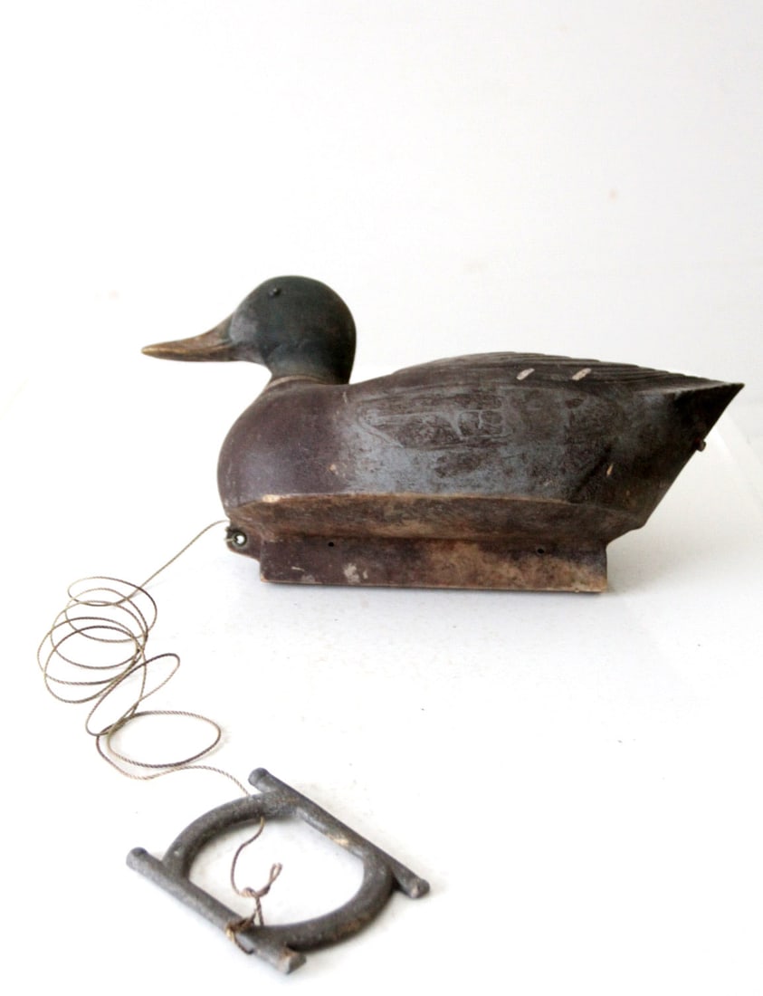 Mid Century Plasti-Duk Mallard Duck Decoy by Neumann & Bennett: Mid Century Plasti-Duk Mallard Duck Decoy by Neumann & Bennett This mid-century vintage Plasti-Duk mallard duck decoy, crafted by Neumann & Bennett of Berkley, CA, features a rustic design complemente