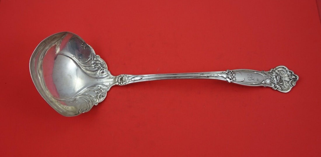 Wallace Carnation Sterling Silver Soup Ladle 13 1/4 Inch Monogrammed: Wallace Carnation Sterling Silver Soup Ladle 13 1/4 Inch Monogrammed This exquisite soup ladle from the renowned Wallace brand features the elegant Carnation pattern, crafted from high-quality sterlin