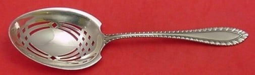 Towle Godroon Sterling Silver 9 7/8" Pierced Pea Serving Spoon: Towle Godroon Sterling Silver 9 7/8" Pierced Pea Serving Spoon Discover the exquisite Godroon by Towle Sterling Silver Pea Spoon, measuring 9 7/8 inches. This elegant serving spoon features a pierced 