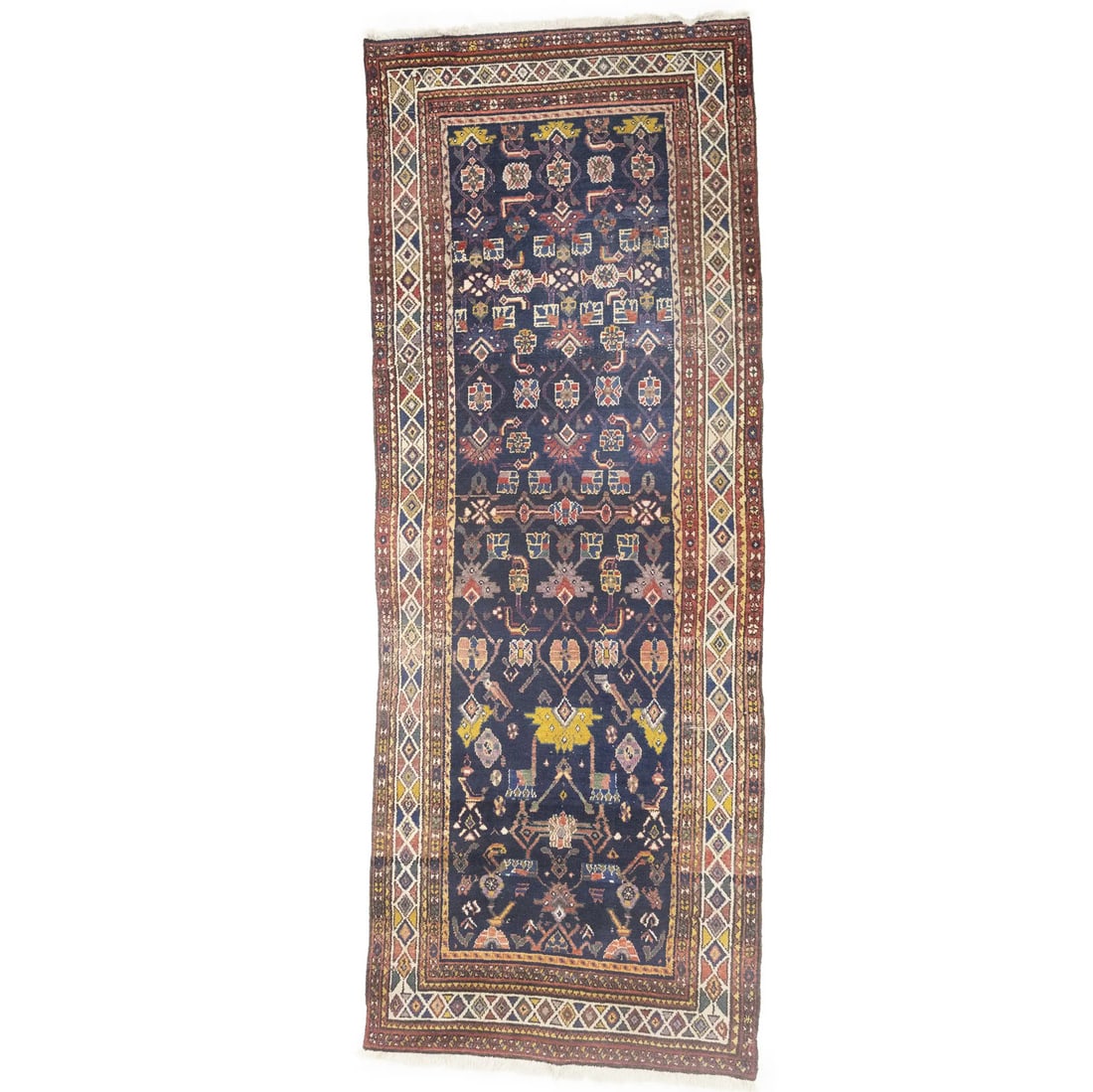 Hand Knotted Wool Floral Runner 3'9 x 9'9 Vintage Tribal: Hand Knotted Wool Floral Runner 3'9 x 9'9 Vintage Tribal This semi-antique vintage oriental runner rug features a hand-knotted floral pattern in muted tones, including purple-navy, cream, brown, gray,