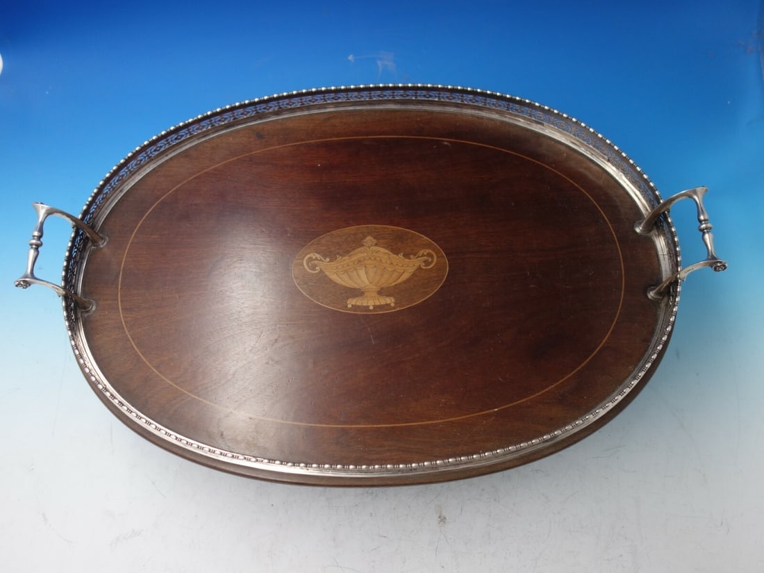 Goodnow & Jenks Beaded Sterling Silver Multi-Wood Tray 20.5": Goodnow & Jenks Beaded Sterling Silver Multi-Wood Tray 20.5" This impressive tray features a beautifully crafted beaded design by Goodnow & Jenks, showcasing sterling silver handles and a border that 