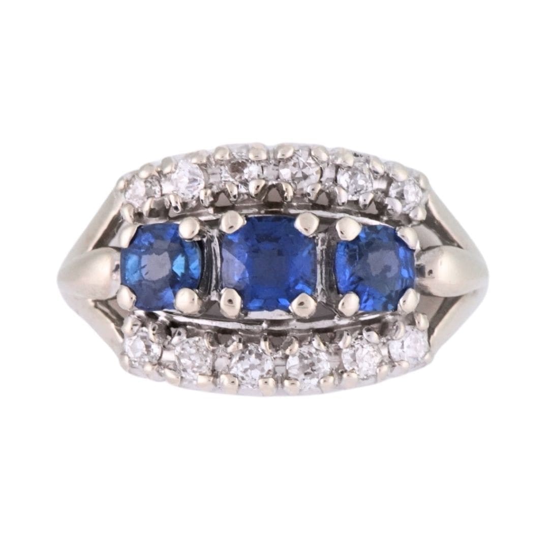 Antique 14K White Gold Ring with Blue Zircon and Old Euro Diamonds: Antique 14K White Gold Ring with Blue Zircon and Old Euro Diamonds Vintage ladies ring crafted in stamped 14K white gold, featuring a dark blue center stone identified as presumed blue zircon and acce