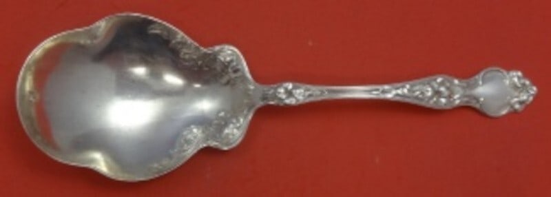 Wallace Violet Sterling Silver Scalloped Berry Spoon 9 1/4": Wallace Violet Sterling Silver Scalloped Berry Spoon 9 1/4" This exquisite serving spoon is a beautiful example of the Violet pattern by Wallace, crafted from high-quality sterling silver. Measuring 9