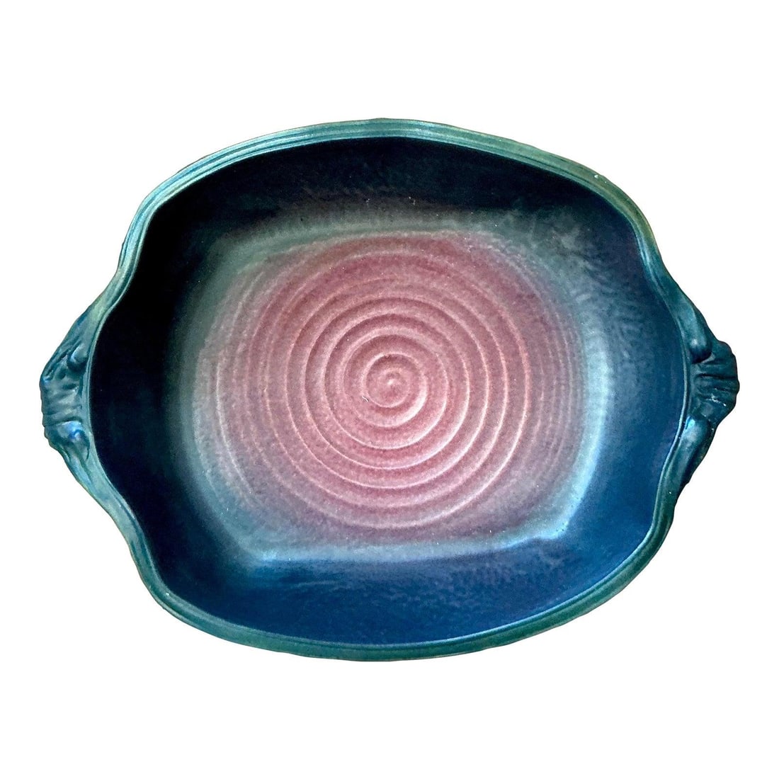 Handcrafted Oval Studio Pottery Serving Bowl with Decorative Handles and Bold Glaze: Handcrafted Oval Studio Pottery Serving Bowl with Decorative Handles and Bold Glaze This vintage studio pottery bowl features an expertly hand-thrown oval form with gently curved sides and sculptural 