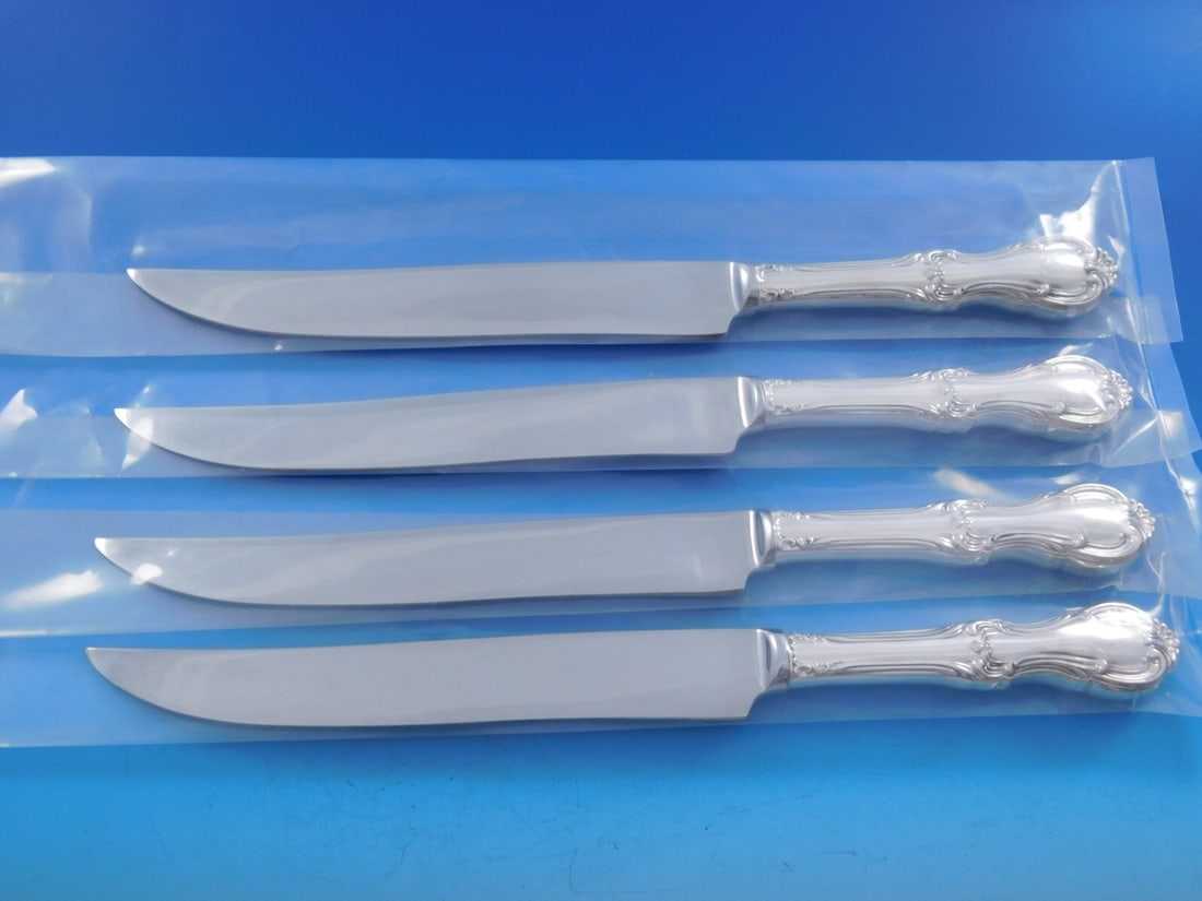 Joan of Arc International Silver 4-Piece Texas Steak Knife Set: Joan of Arc International Silver 4-Piece Texas Steak Knife Set Introducing the Joan of Arc Sterling Silver Steak Knife Set, a stunning 4-piece collection that embodies both elegance and strength. Craf