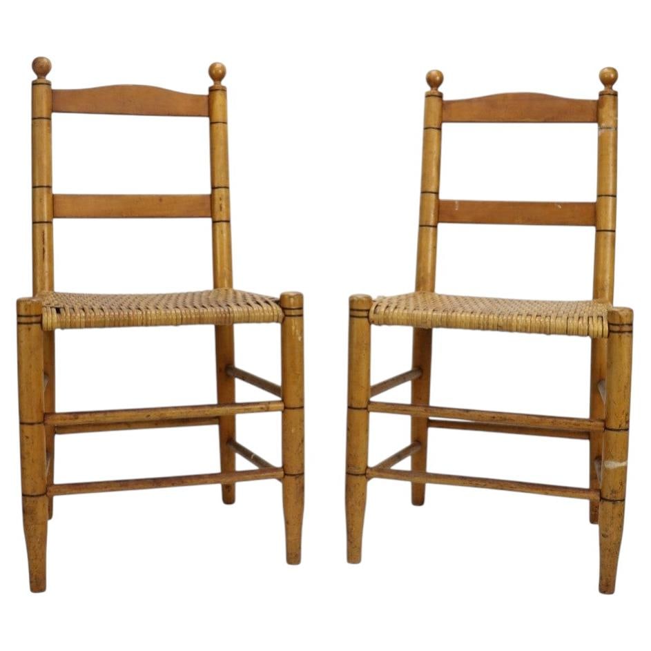 Set of 2 Folk Art Child Chairs Maple Rush Ebonized c1920: Set of 2 Folk Art Child Chairs Maple Rush Ebonized c1920 Pair of antique folk art children's chairs crafted from maple with hand-woven rush seats and ebonized trim accents. Dating to circa 1920, these