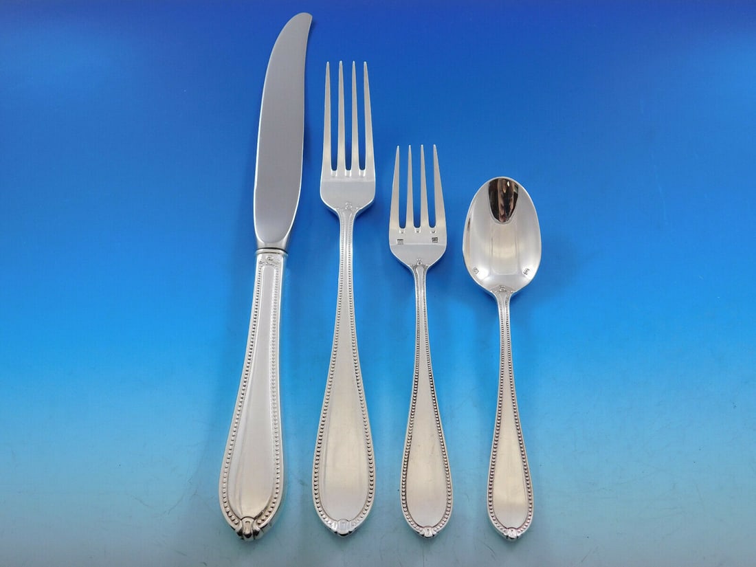 Tuttle Triumph sterling silver 4 piece dinner place setting: Tuttle Triumph sterling silver 4 piece dinner place setting This is a Tuttle sterling silver dinner size 4-piece place setting in the Triumph pattern. The set includes a dinner knife, dinner fork, sal