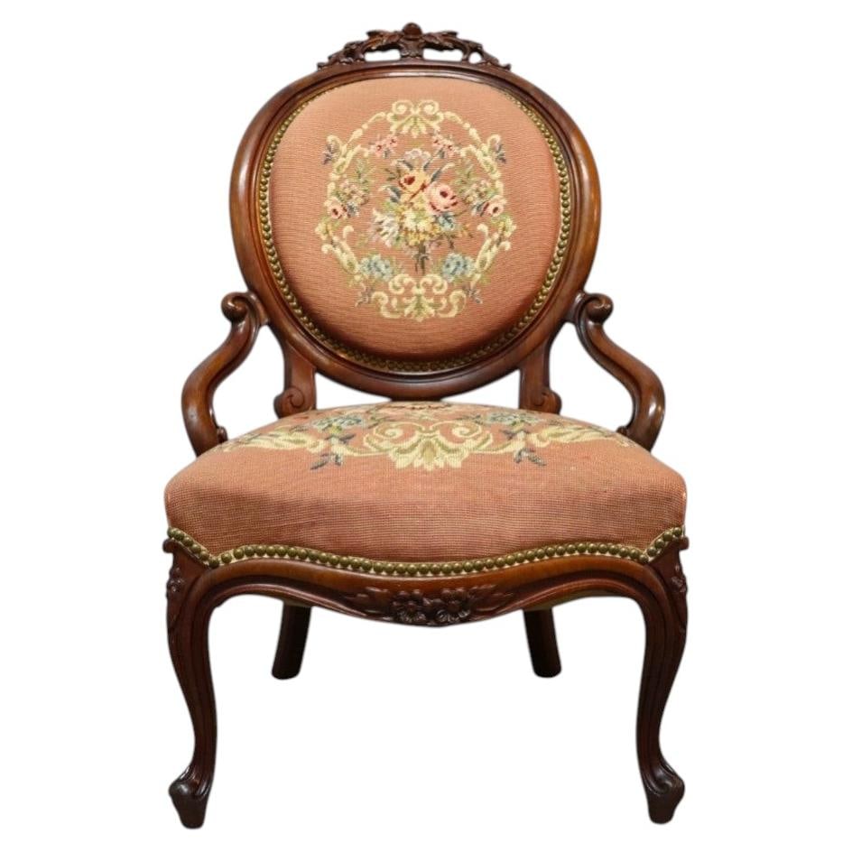 c1900 Victorian Louis XV Style Mahogany Armchair Floral Tapestry Upholstery: c1900 Victorian Louis XV Style Mahogany Armchair Floral Tapestry Upholstery Elegant Victorian-era armchair executed in the Louis XV style, dating to circa 1900. The balloon-back form features floral c