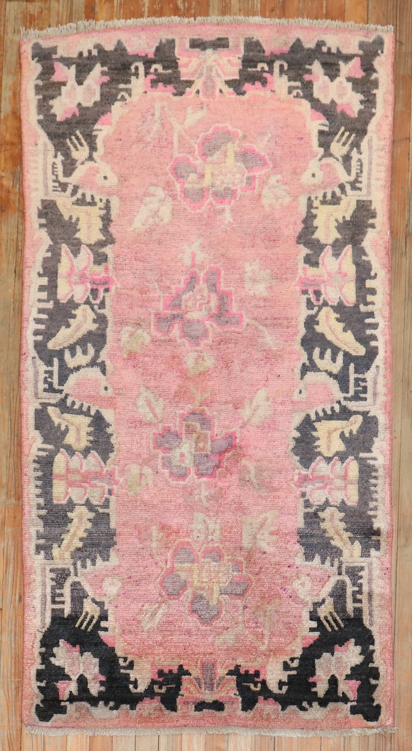 3' x 4' 9" Tibetan Floral Rug in Soft Pink: 3' x 4' 9" Tibetan Floral Rug in Soft Pink Vintage Tibetan floral rug in a soft pink tone. This pre-owned small rug features a floral design and dates to the 1930s. Specifications Type: Tibetan Catego