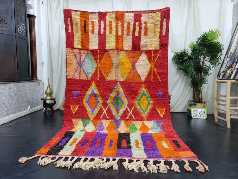 Vibrant Handmade Moroccan Berber Wool Rug 10 x 5 Feet: Vibrant Handmade Moroccan Berber Wool Rug 10 x 5 Feet Experience the charm of Moroccan craftsmanship with this elegant and artistic handmade Berber wool rug. Woven by skilled local Berber women in the