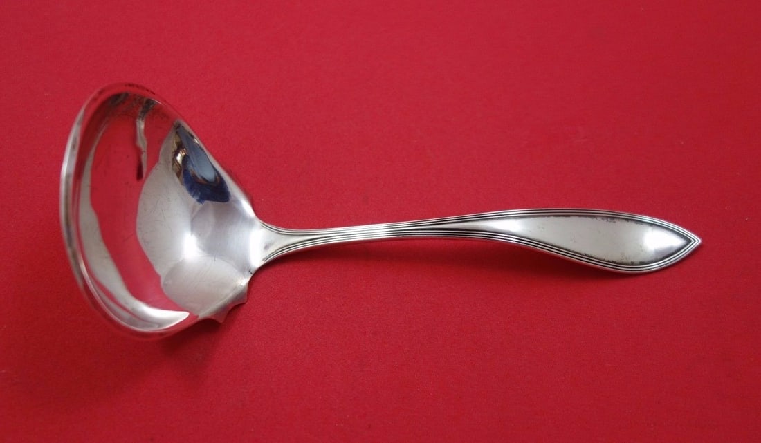 Puritan International Sterling Silver Gravy Ladle 6.75 Inch: Puritan International Sterling Silver Gravy Ladle 6.75 Inch This exquisite Puritan gravy ladle by International is crafted from high-quality sterling silver. With a length of 6 3/4 inches, this ladle 