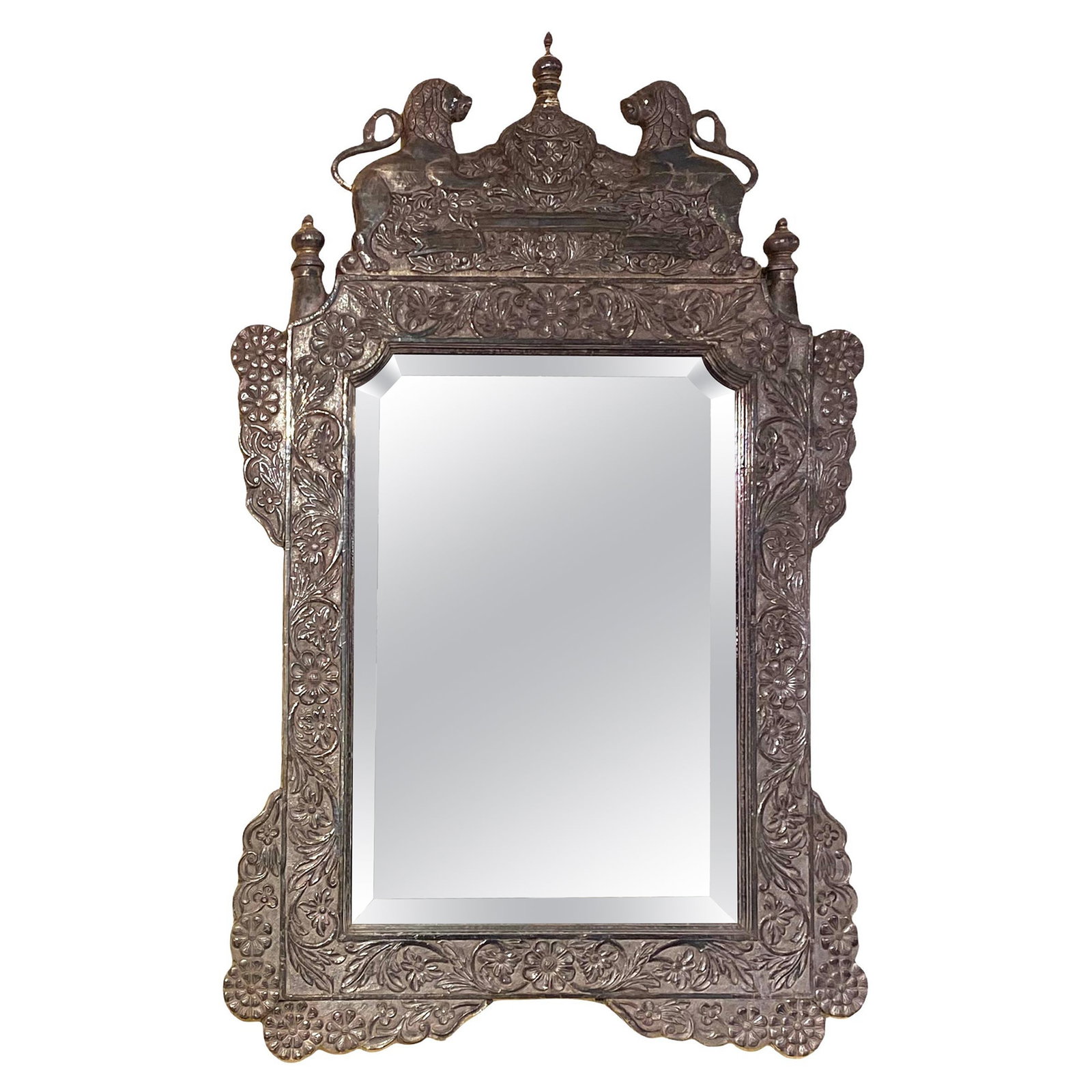 19th Century Indian Repousse Silver Overlay Mirror Late Victorian Style: 19th Century Indian Repousse Silver Overlay Mirror Late Victorian Style This is a finely crafted 19th-century Indian mirror featuring an ornate silver clad frame with repousse detailing. Created durin