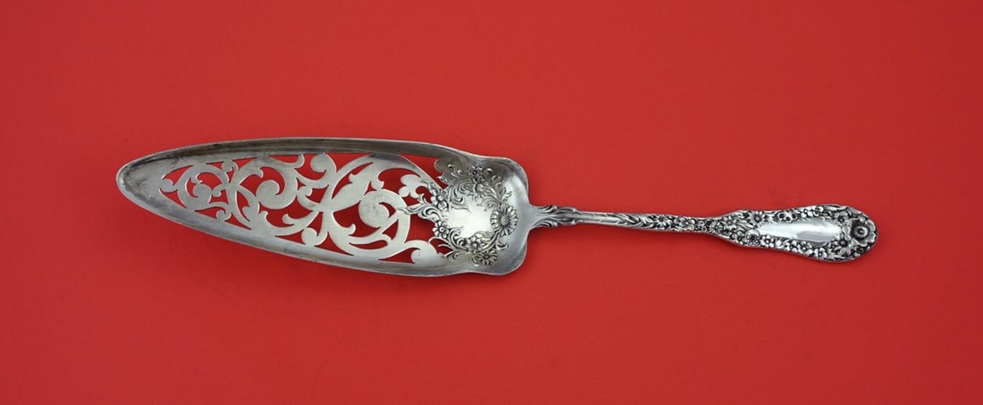 Dominick & Haff Number 10 Sterling Silver Jelly Cake Server 10 1/8": Dominick & Haff Number 10 Sterling Silver Jelly Cake Server 10 1/8" This exquisite jelly cake server from Dominick and Haff showcases the elegant Number 10 pattern, crafted from high-quality sterling 