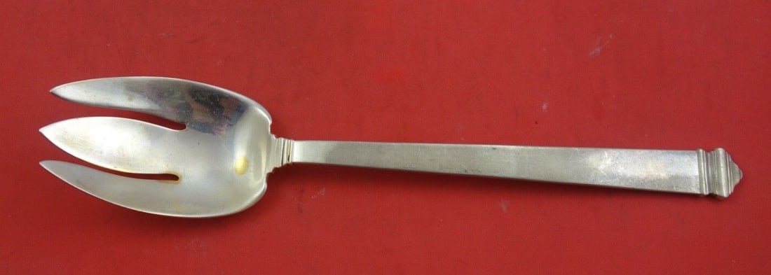 Tiffany & Co. Hampton Sterling Silver Salad Serving Fork 10": Tiffany & Co. Hampton Sterling Silver Salad Serving Fork 10" This exquisite 10" salad serving fork is crafted from high-quality sterling silver by Tiffany & Co. It features the elegant Hampton pattern
