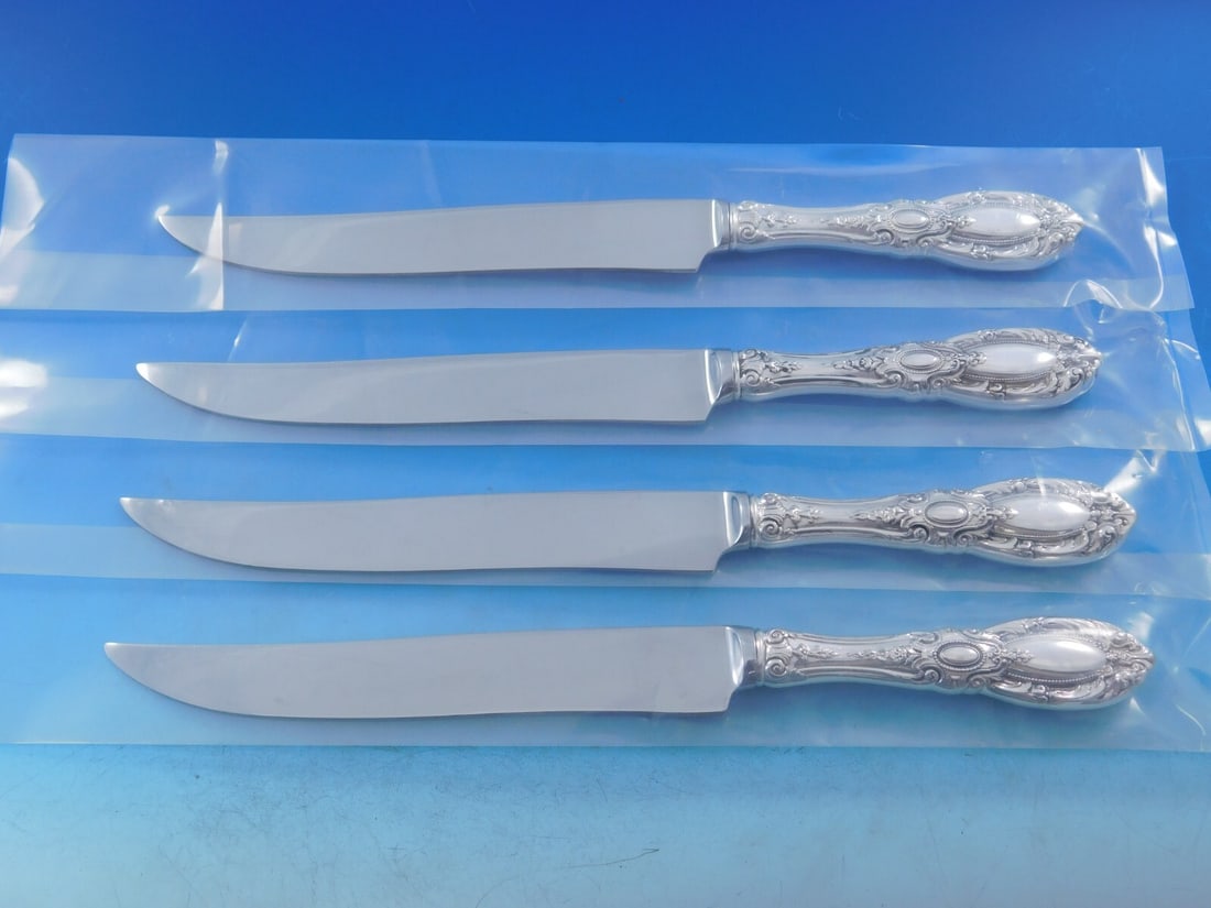 Towle King Richard Sterling Silver 4pc Texas Steak Knife Set: Towle King Richard Sterling Silver 4pc Texas Steak Knife Set Elevate your dining experience with this exquisite 4-piece steak knife set from the King Richard pattern by Towle. Crafted from sterling si
