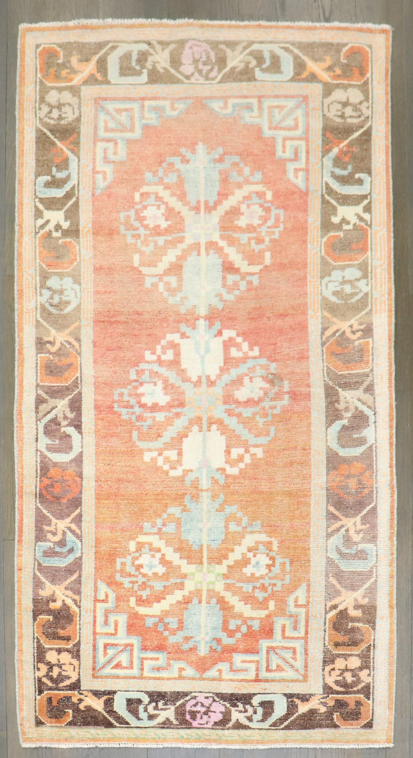 3' x 5' 5" Mid 20th Century Floral Tibetan Rug: 3' x 5' 5" Mid 20th Century Floral Tibetan Rug Vintage Tibetan rug featuring a floral design in a small-format size. This mid-20th century piece is offered in pre-owned condition. Specifications Item 