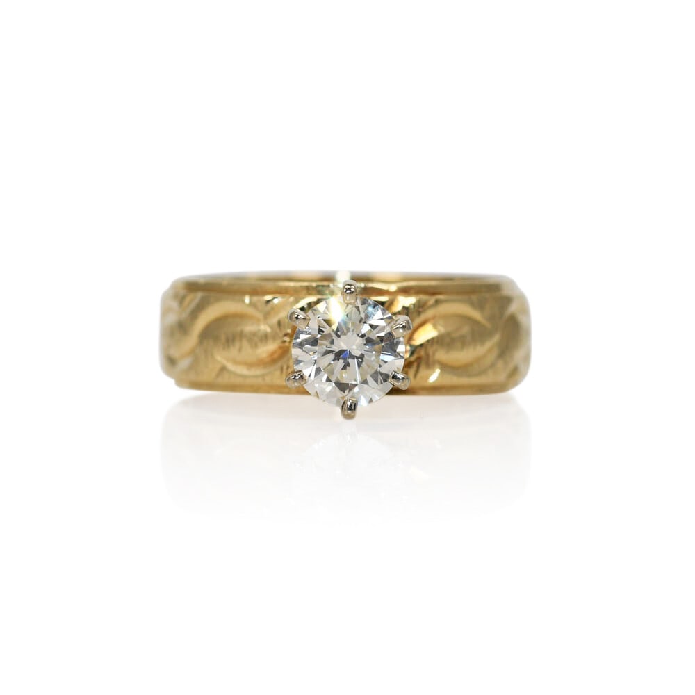 Unbranded 14K Yellow Gold Solitaire Ring with 0.60ct Diamond Size 7: Unbranded 14K Yellow Gold Solitaire Ring with 0.60ct Diamond Size 7 Pre-owned solitaire diamond ring featuring a natural round brilliant diamond set in an ornate 14k yellow gold band. The center diamo