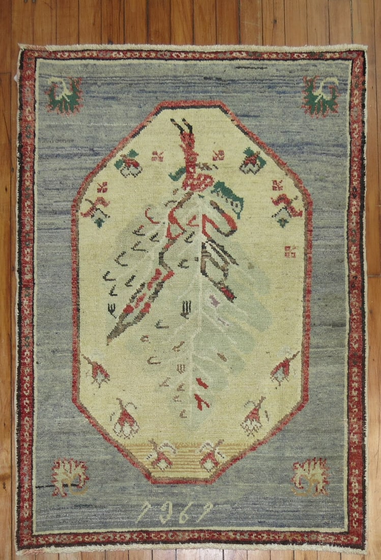 2' 11" x 3' 8" Turkish Anatolian Pictorial Rug: 2' 11" x 3' 8" Turkish Anatolian Pictorial Rug Mid-20th century Turkish pictorial rug in a small square-format Anatolian design. This pre-owned piece features the pictorial style noted in the original