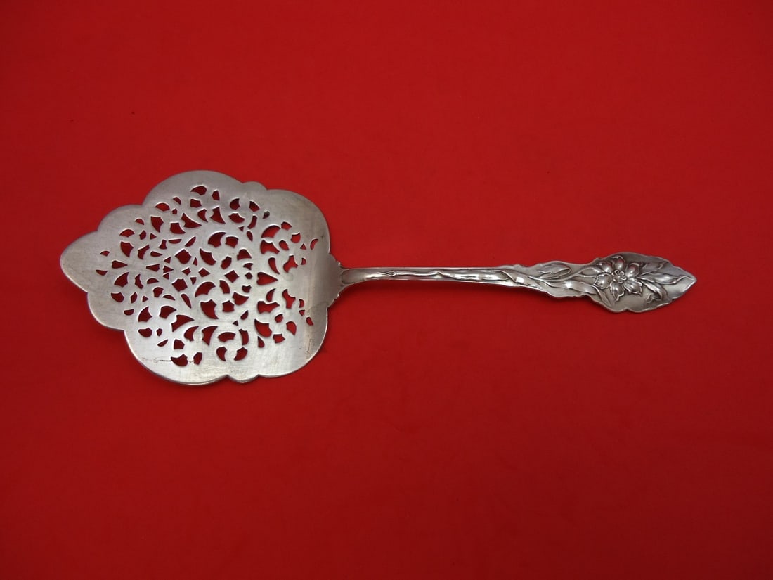 Unger Narcissus Sterling Silver 7 Inch Cucumber Server Pierced: Unger Narcissus Sterling Silver 7 Inch Cucumber Server Pierced This exquisite cucumber server features the elegant Narcissus pattern by Unger, crafted from high-quality sterling silver. Measuring 7 in
