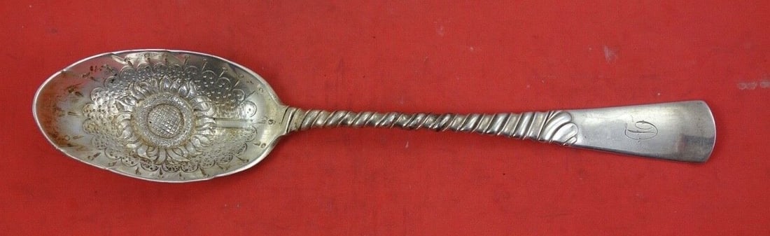 Gorham Colonial Sterling Silver Berry Spoon Sunflower 8 1/4 Inch: Gorham Colonial Sterling Silver Berry Spoon Sunflower 8 1/4 Inch This exquisite Colonial by Gorham sterling silver berry spoon features a beautiful sunflower design, measuring 8 1/4 inches in length. 