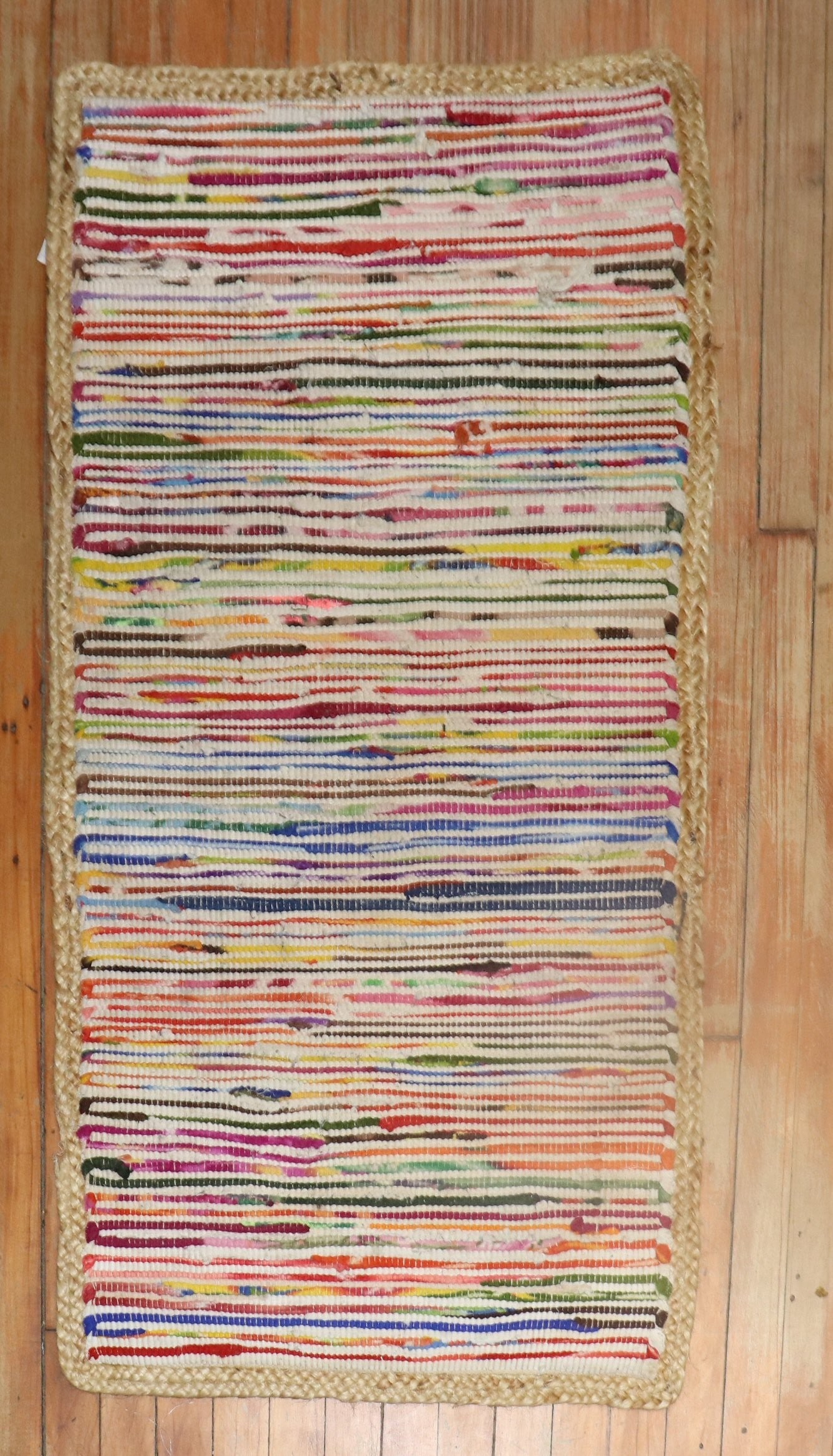 2' 1" x 3' 9" American Rag Rug Small Area Carpet: 2' 1" x 3' 9" American Rag Rug Small Area Carpet American rag throw rug from the 3rd quarter of the 20th century. This pre-owned small rag rug features a colorful striped design and is categorized as 