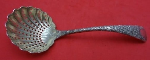 Whiting Antique Chased Sterling Silver Sugar Sifter 6.25 Inches: Whiting Antique Chased Sterling Silver Sugar Sifter 6.25 Inches This exquisite sugar sifter from Whiting, dating back to 1850-1899, showcases the intricate Antique Chased pattern. Made of sterling sil