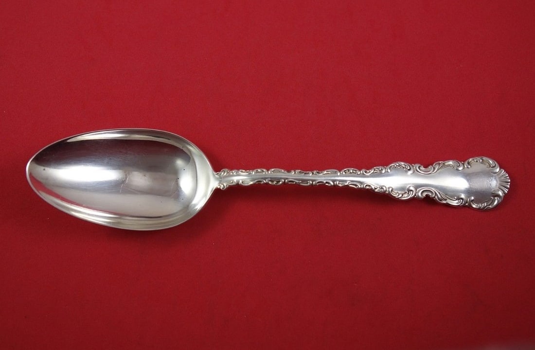 Roden Louis XV Sterling Silver Serving Spoon 8 1/4 Inch: Roden Louis XV Sterling Silver Serving Spoon 8 1/4 Inch This exquisite serving spoon features the elegant Louis XV pattern by Roden, crafted from high-quality sterling silver. Measuring 8 1/4 inches i