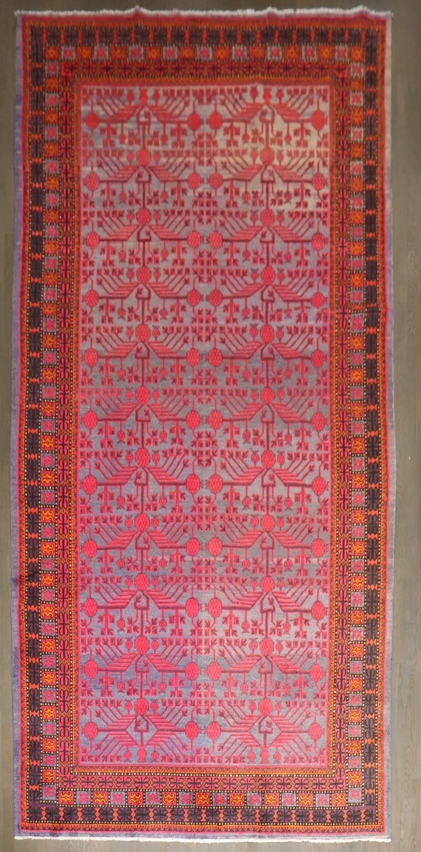 6' 4" x 13' 10" Khotan Samarkand gallery carpet pomegranate motif: 6' 4" x 13' 10" Khotan Samarkand gallery carpet pomegranate motif Vintage Khotan Samarkand carpet with a pomegranate motif in a long gallery size. This pre-owned piece dates to the second quarter of t