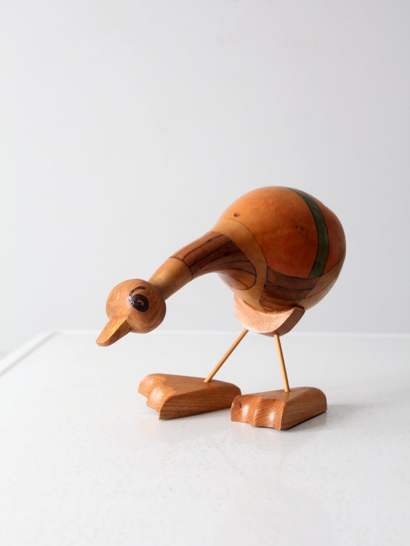 Vintage Hand-Made Gourd Bird with Wooden Features 8.5" Tall: Vintage Hand-Made Gourd Bird with Wooden Features 8.5" Tall Add a whimsical touch to your decor with this vintage hand-made gourd art bird. Featuring a curious expression and intricate detailing, this