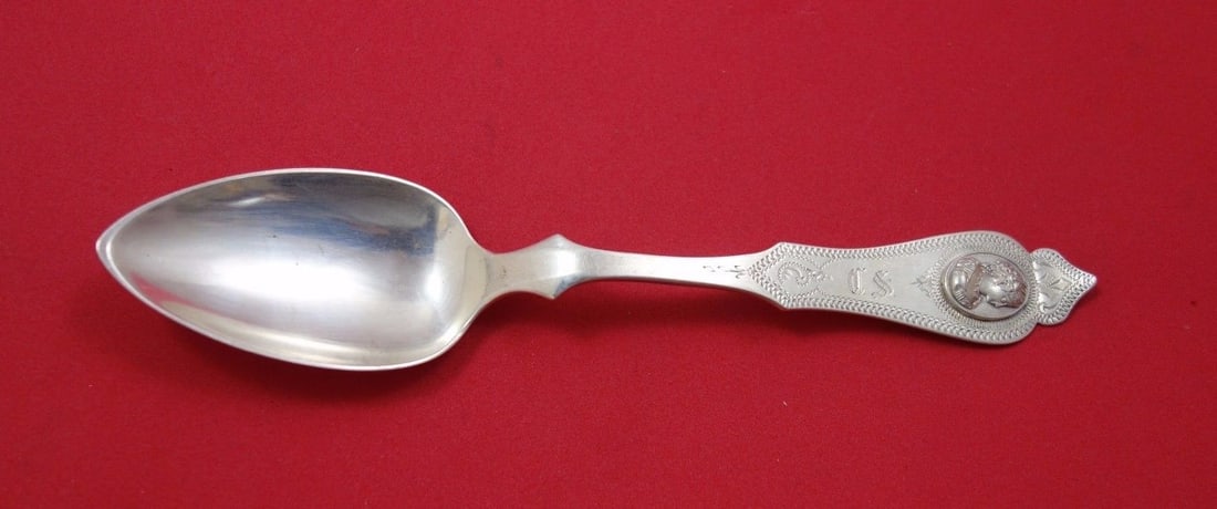 Clemens Oskamp Medallion Sterling Silver Soup Spoon 7 1/8": Clemens Oskamp Medallion Sterling Silver Soup Spoon 7 1/8" This exquisite Medallion place soup spoon, crafted by Clemens Oskamp, showcases the elegance and craftsmanship of the 19th century. Made from