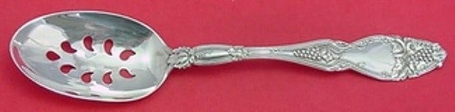 International Cloeta Sterling Silver Slotted Serving Spoon 9 Hole Custom: International Cloeta Sterling Silver Slotted Serving Spoon 9 Hole Custom Sterling silver serving spoon in the Cloeta pattern by International. This post-1940 piece is custom made, features a pierced 9