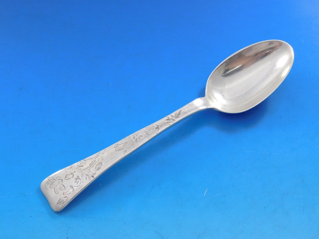 Tiffany Sterling Silver 7 Inch Lap Over Edge Soup Spoon Floral Design: Tiffany Sterling Silver 7 Inch Lap Over Edge Soup Spoon Floral Design This exquisite Lap Over Acid Etched Place Soup Spoon by Tiffany & Co. showcases a beautiful floral design. Crafted from high-quali