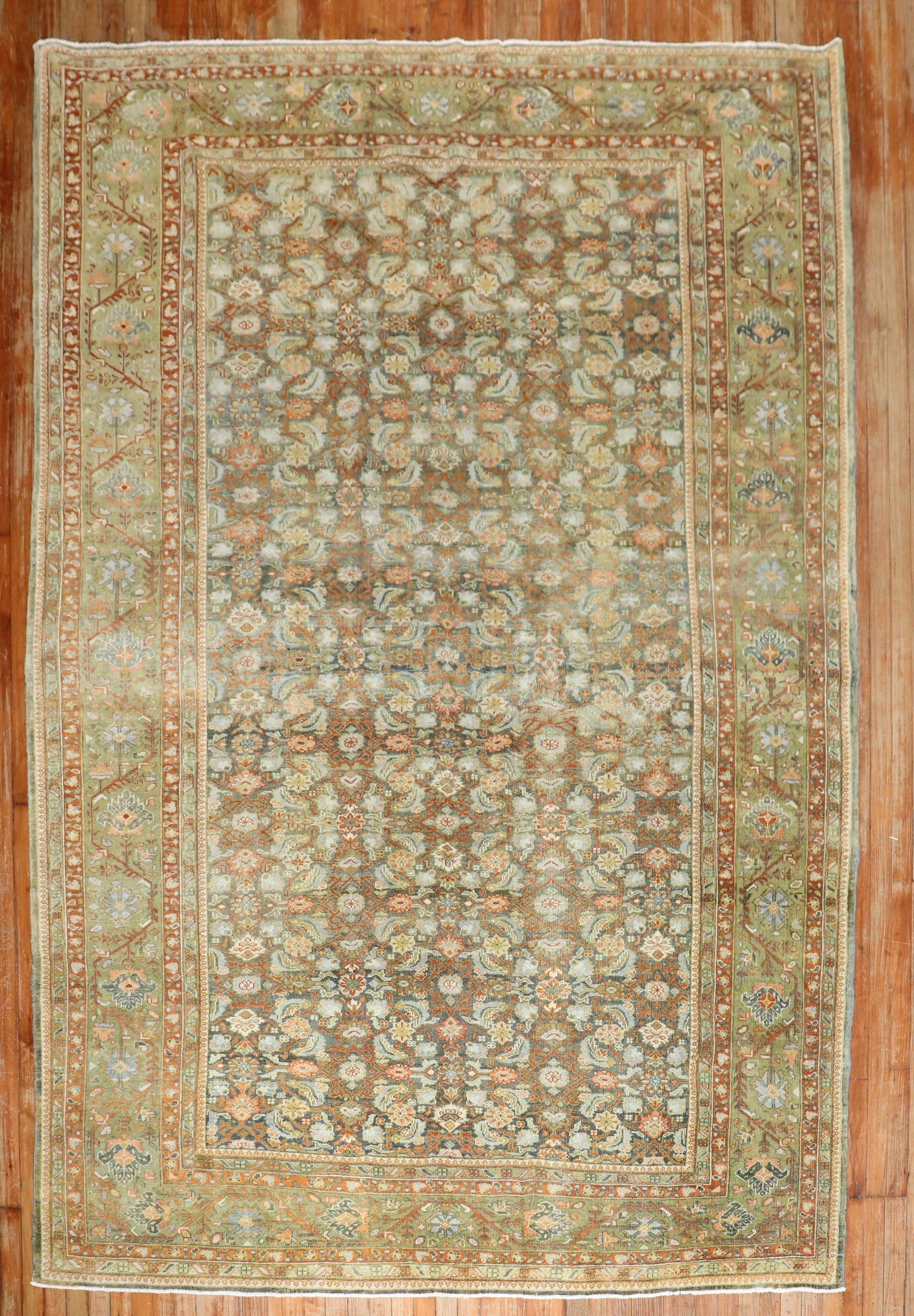 7' 2" x 10' 2" Malayer Persian Herati Design Room Rug: 7' 2" x 10' 2" Malayer Persian Herati Design Room Rug Antique Persian rug featuring a Herati design in earth tones with coral and chartreuse accents. This pre-owned room-size rug is identified as a Ma